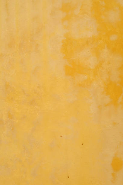 istock old wall background yellow color 859296974