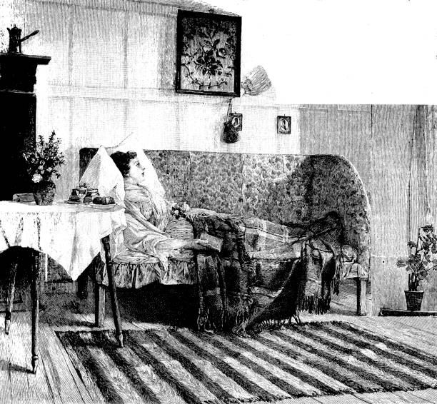 istock 19th century story illustration; victorian lady invalid laid out on sofa with tartan rug over her and book in her hand; Victorian lady in her drawing room 1893 859310608