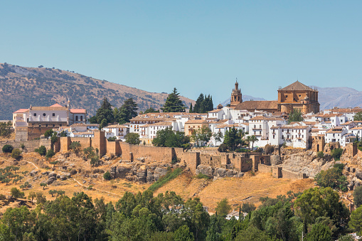 View of Ronda in Andalusia, Spain. On the right is the Santa Maria la Mayor church.
