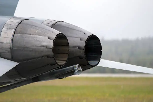 Fighter jet engine nozzles. The engines are off. Closeup view.