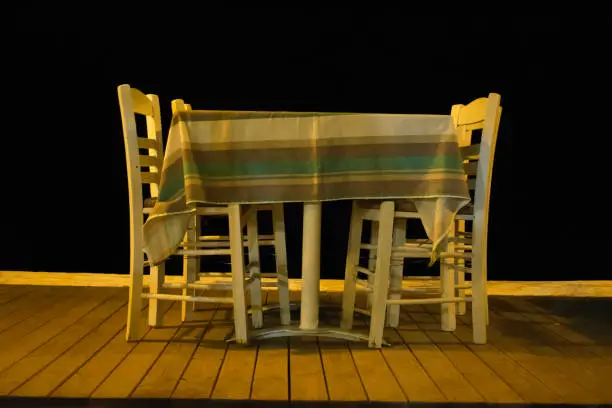 Photo of Traditional Greek Tavern at Night Greece