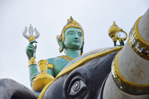 CHACHOENGSAO, THAILAND - SEPTEMBER 17, 2017 : Sculpture of Indra the god of Hindu on Airavata (Name of an elephant) at Saman Rattanaram temple