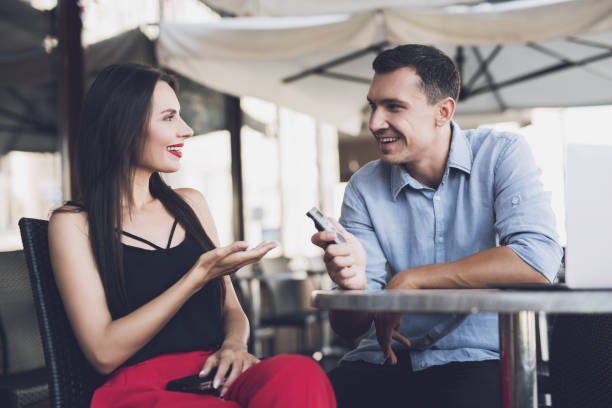 istock A journalist talking with a beautiful girl 859323136