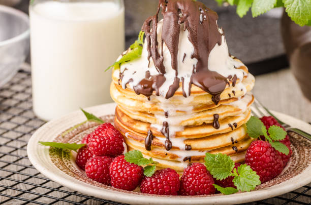 istock American pancakes with icecream and chocolate 859325392