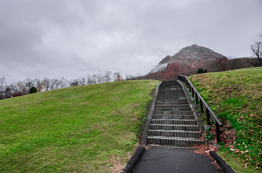 Showa-shinzan is a volcanic lava dome in the Shikotsu-Toya National Park, Hokkaido, Japan, next to Mount Usu. The mountain was created between 1943 and 1945. It is is one of Japan's youngest mountain.