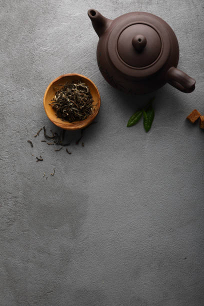 istock Green tae and teapot, food background 859346534