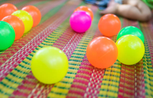 Purple Fi̇tness Ball on Wooden Floor With Dim Background