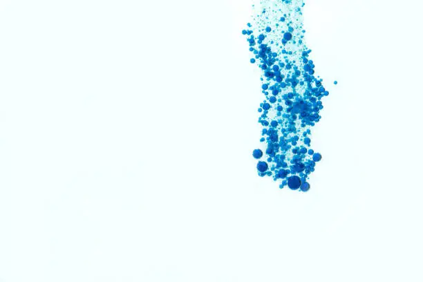 Blue gas bubbles isolated over white.