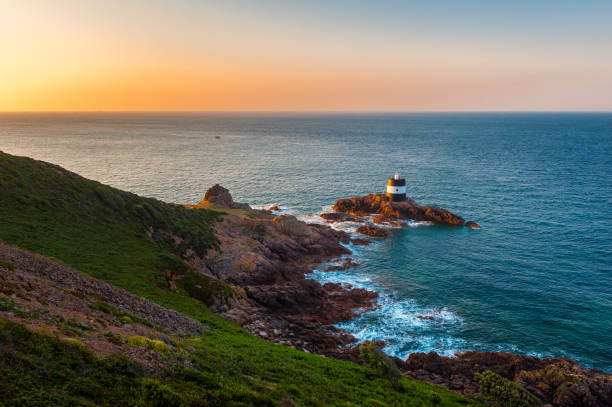 Lighthouse of Saint Brelade, Jersey, Channel Islands, UK at Sunrise.