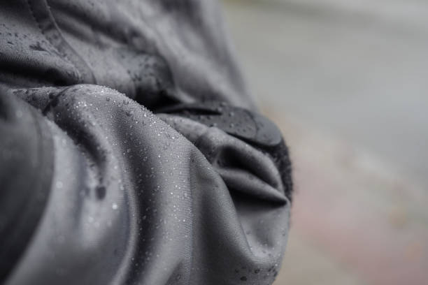Waterproof jacket with rain drops stock photo