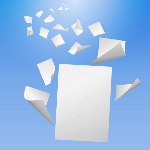 istock White blank sheets of paper with bent corners flying away into the blue sky 859375366