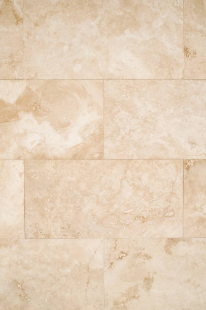 istock New orange  stone wall closeup  in sunny day 859382756