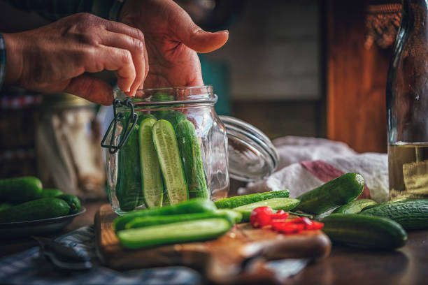 istock Preserving Organic Cucumbers in Jars 859382816