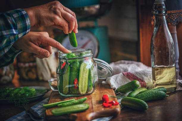 istock Preserving Organic Cucumbers in Jars 859382828