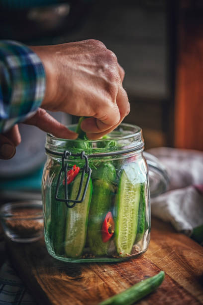 istock Preserving Organic Cucumbers in Jars 859382842