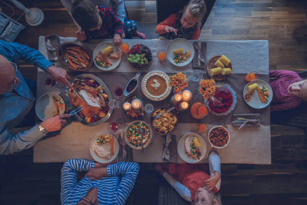istock Family Having Traditional Holiday Stuffed Turkey Dinner 859382968