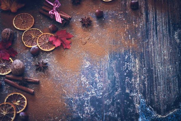 istock Autumn Background with Nuts, Spices and Candied Oranges 859382976