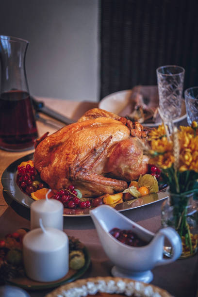 istock Family Having Traditional Holiday Stuffed Turkey Dinner 859382992