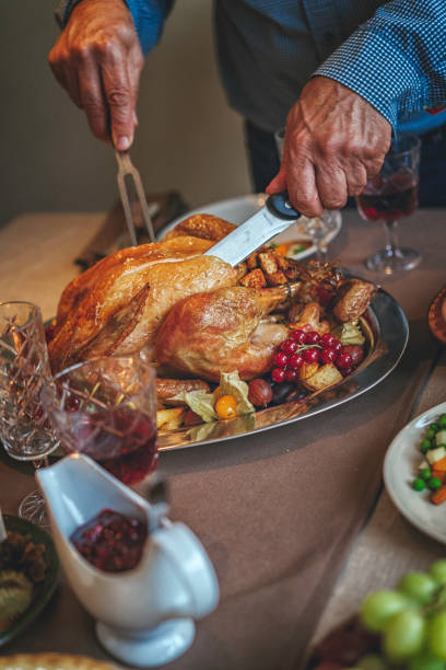 istock Family Having Traditional Holiday Stuffed Turkey Dinner 859383006