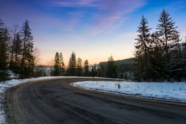 istock red dawn on serpentine in winter forest 859387532