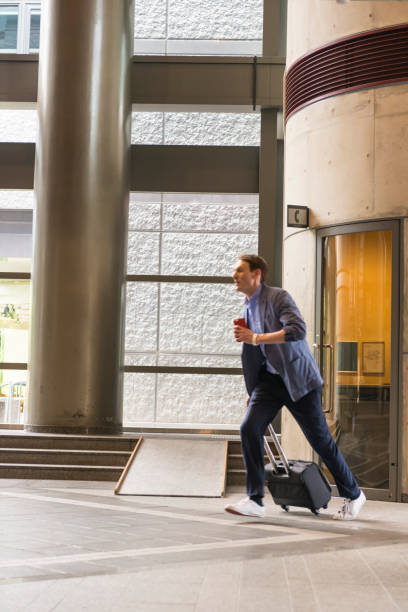 istock One businessmen in company lobby 859389838