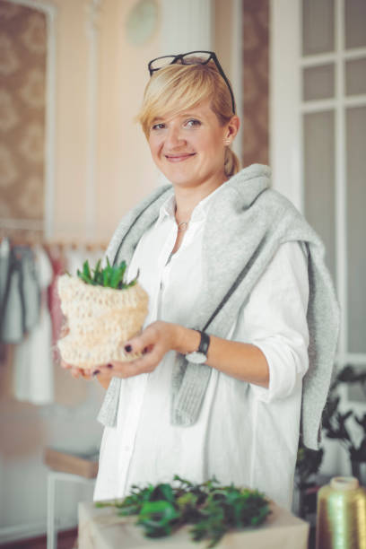 istock Holding an Aloe Vera Plant 859397378