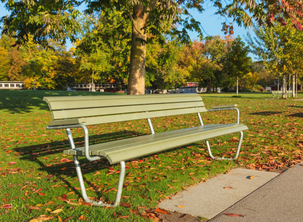 istock Bench in a park in atumn 859410228