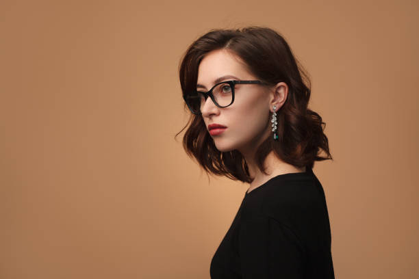 istock Attractive woman in glasses looking away 859417074
