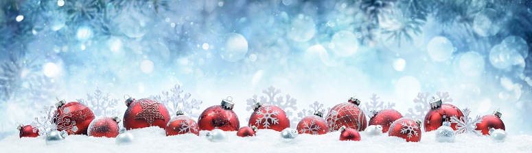 Decorated Red Baubles On Snow With Snowy Background