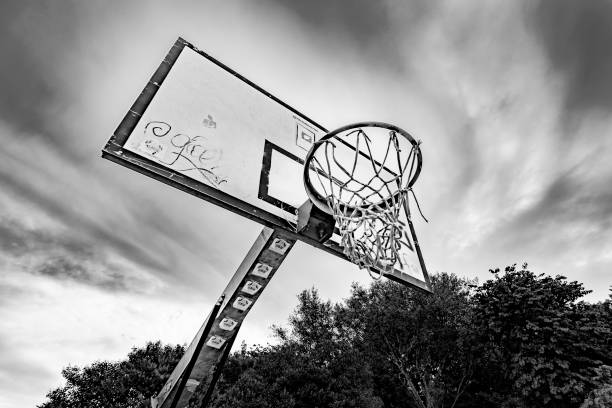 Basketball court Italy, Rome, San Lorenzo and Porta Maggiore - 08 May 2016 - basketball court in San Lorenzo, early in the morning, nobody there. san lorenzo rome photos stock pictures, royalty-free photos & images