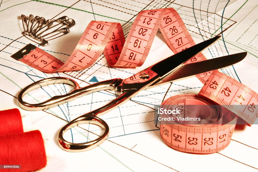 Tailor Sewing Accessories On Fabric Curve Seamstress Clothing Scissors And  Ruler Stock Photo - Download Image Now - iStock