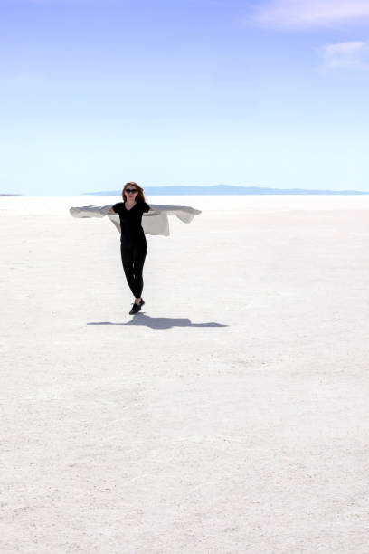 istock Woman at salt lake 859444554