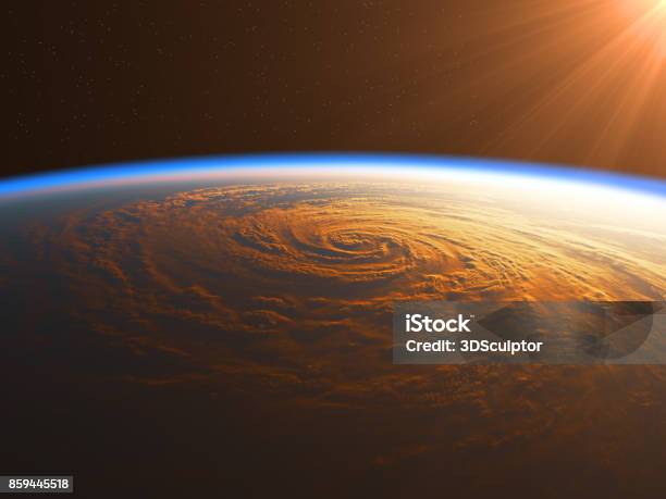 Hurricane In The Rays Of Sun Stock Photo - Download Image Now - Planet Earth, Satellite View, Outer Space