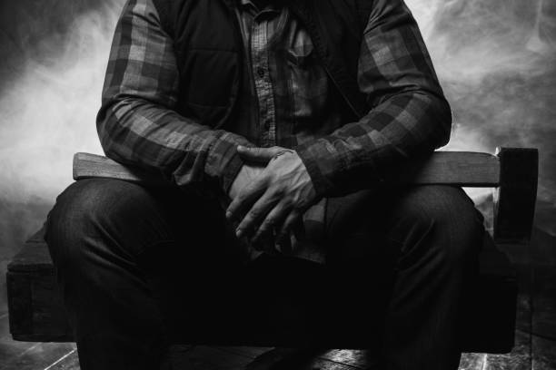 istock Armed axeman in atmospheric smoke. Dangerous male 859461688
