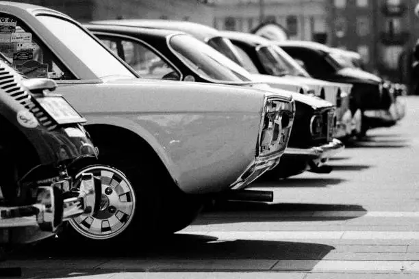 some old timer cars in black and white. Vintage, classic.