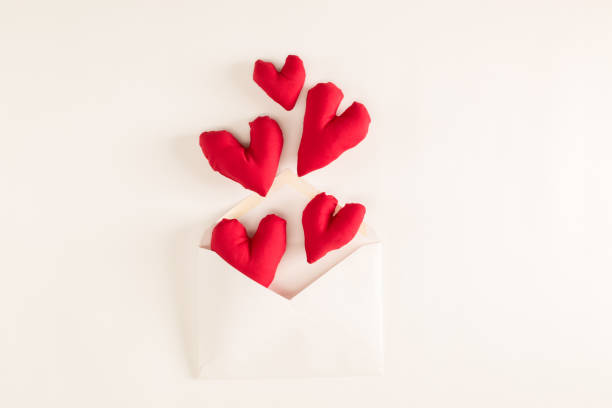 istock Love and Valentine's Day theme with heart cushions and envelope 859500540