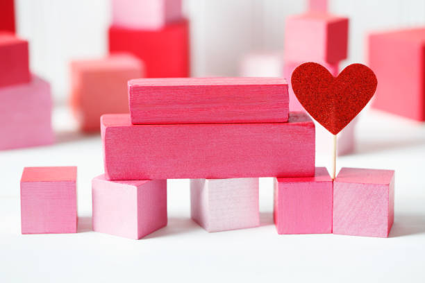 istock Red and pink wooden blocks with small heart 859500686