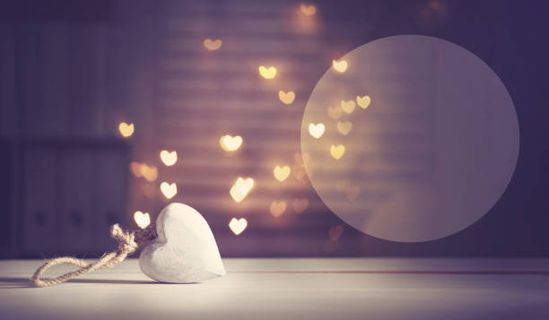 istock White heart with heart shaped lights 859500746