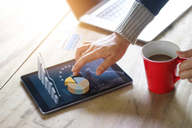 istock Business people using laptop and tablet of technology e-comerce internet global network connection marketing purchasing and business statistic growth graph, business success concept 859500872