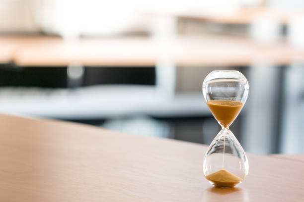 istock Sand clock, business time management concept 859510316