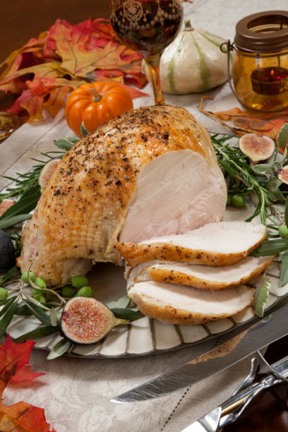 istock Carving Mediterranean Style Whole Roasted Turkey Breast 859510566
