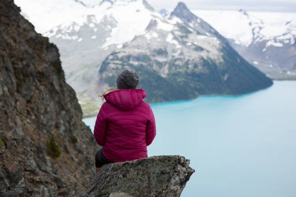 istock Woman sits and admires the view 859525750