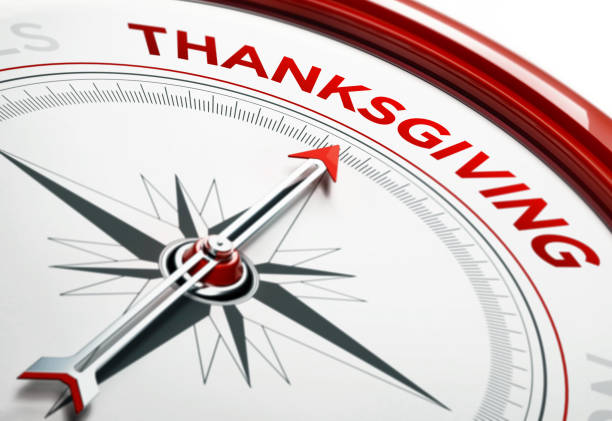 istock Thanksgiving Concept: Arrow of A Compass Pointing Thanksgiving Text 859529182