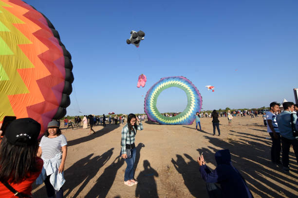 Surabaya, Indonesia - August 20, 20017: Kite flying at the Surabaya International Kite Festival 2017 in Pakuwon City Surabaya, East Java, Indonesia on 20 August 2017