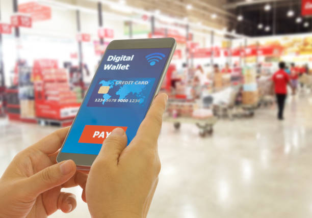 Digital wallet to pay Digital wallet to pay for goods and services in a superstore for easy and fast. digital wallet photos stock pictures, royalty-free photos & images