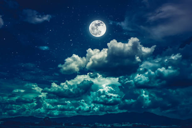 istock Night sky with bright full moon and dark cloud, serenity nature background. 859532918