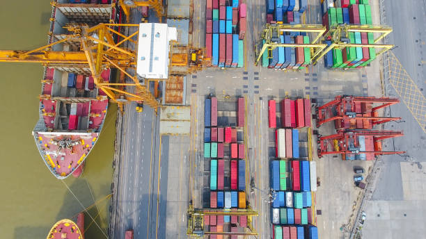 istock Logistics and transportation of Container Cargo ship and Cargo working crane bridge in shipyard 859533560