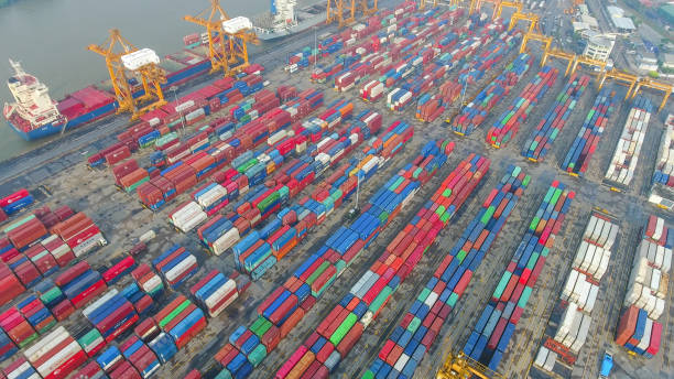 istock Logistics and transportation of Container Cargo ship and Cargo working crane bridge in shipyard 859536032