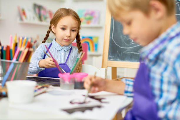 istock Children Painting in Art Class of Development School 859536116