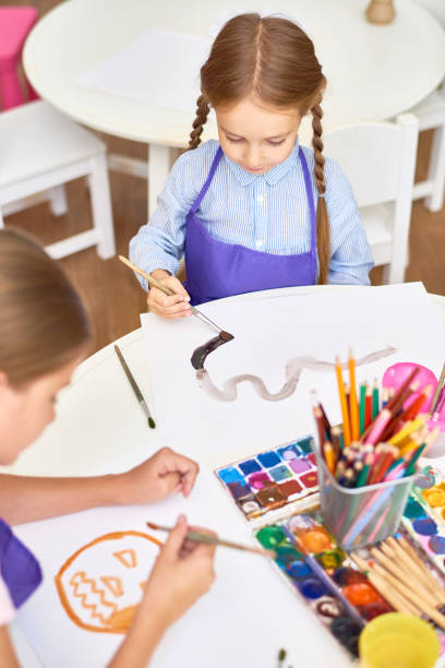 istock Children Painting in Art Class 859536186